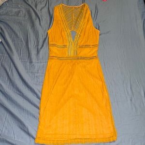 Cocktail Dress with mesh overlay and open back